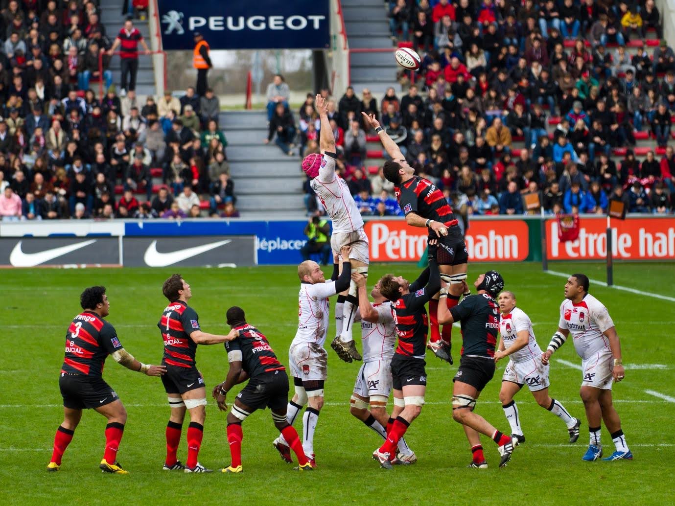 rugby players fighting for a ball