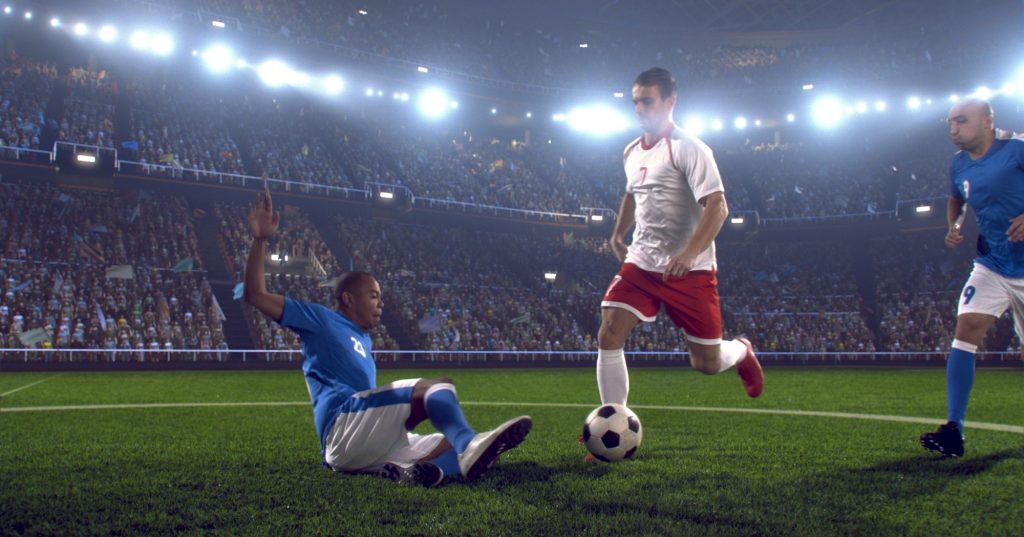 football players fighting for a ball