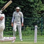cricket players playing cricket