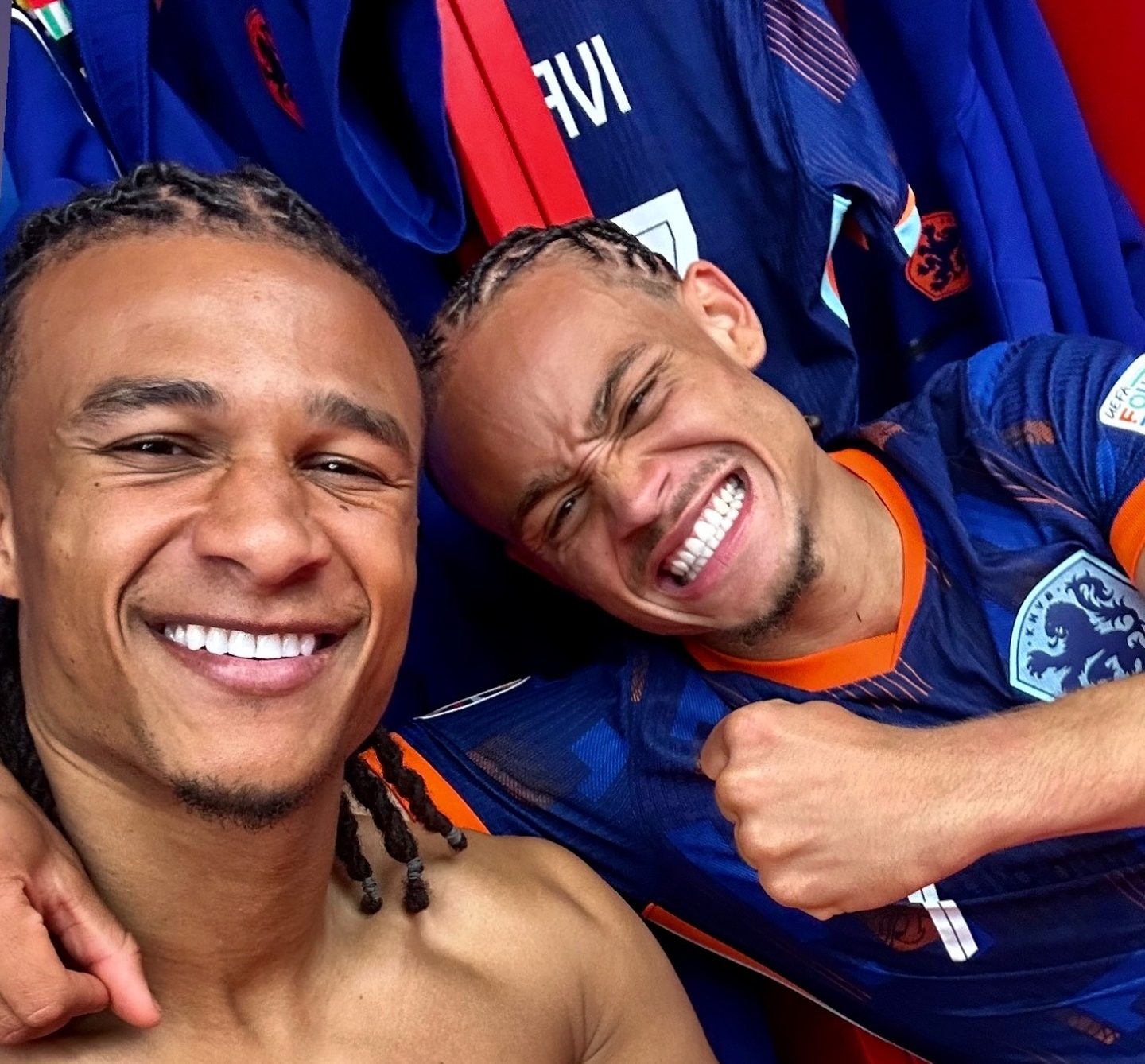 Two Netherlands players celebrating after the win 