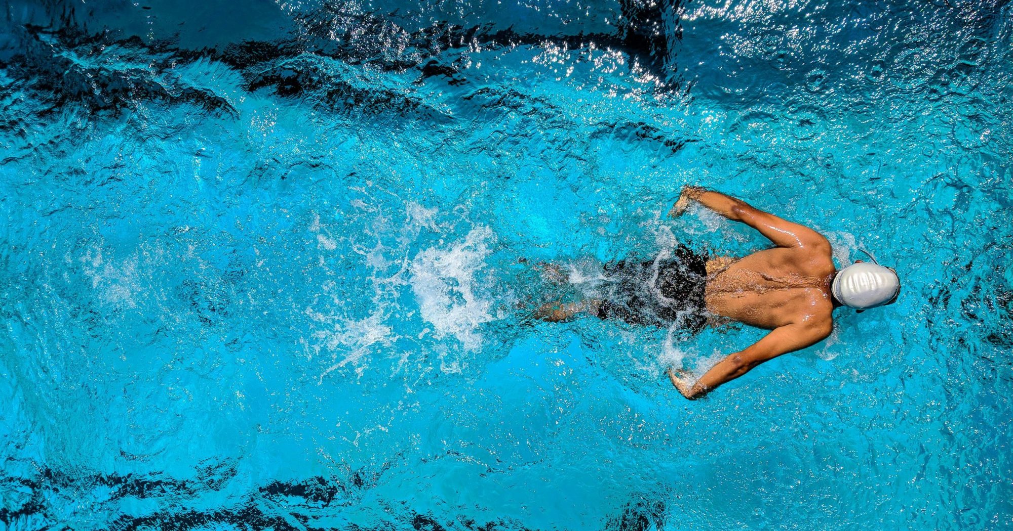 Man swimming in a swimming pool
