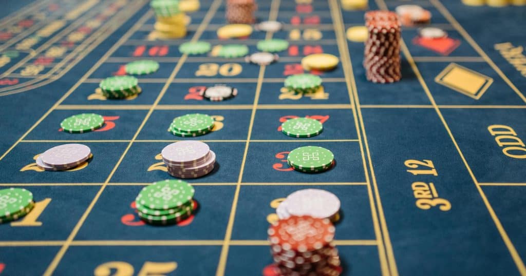 casino chips on a roulette table