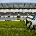 Football ball in an empty stadium