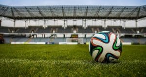 Football ball in an empty stadium