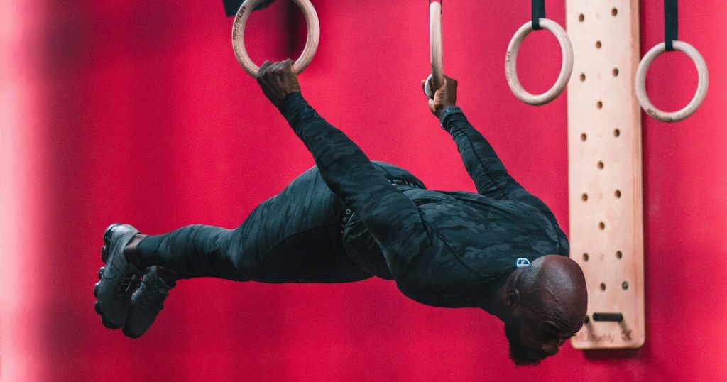 Man doing gymnastic exercises