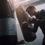 Man punching a punching bag