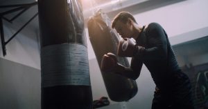 Man punching a punching bag
