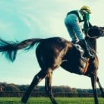Man on a race horse
