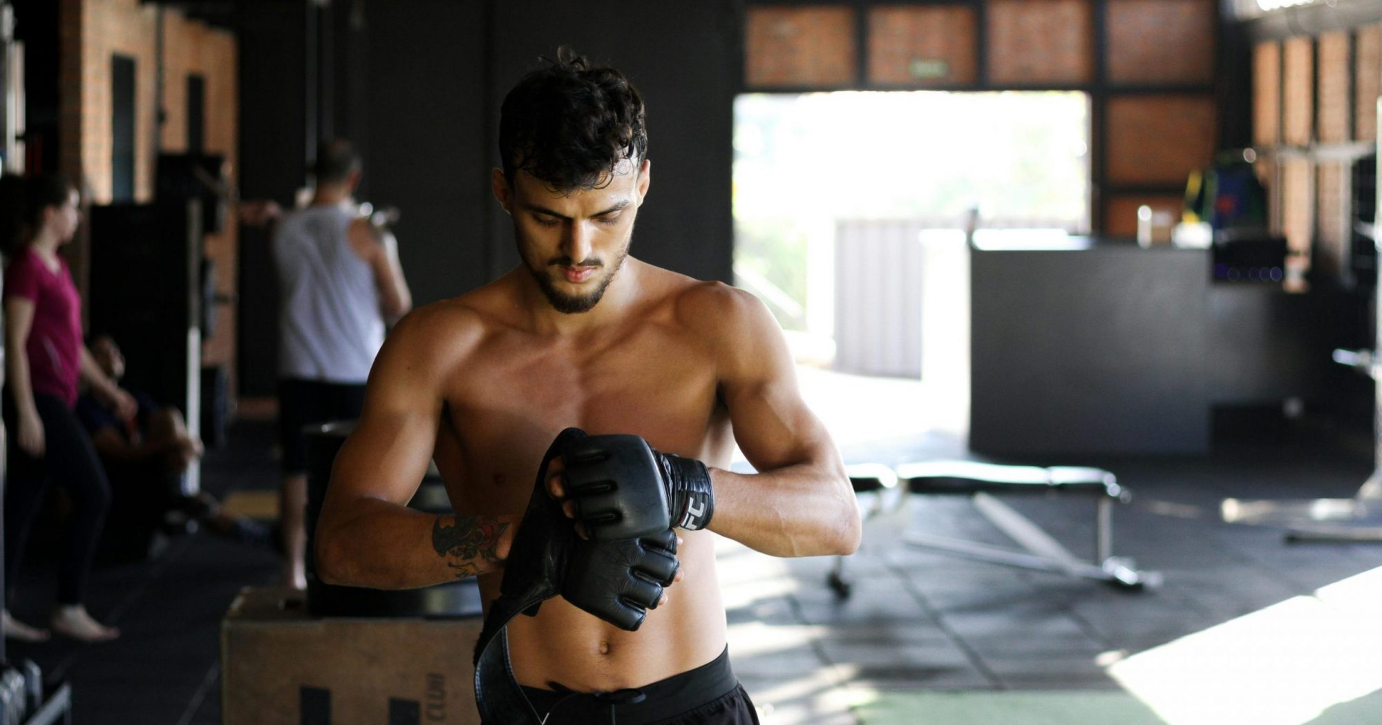 Man Standing Wearing Black Leather Gloves