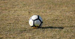 Football ball in the field