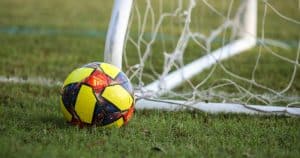 Football ball near the net