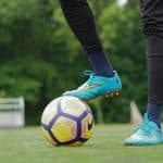 Football player with football ball