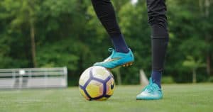 Football player with football ball