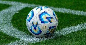 Football ball in the fields corner