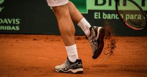 Man serving a tennis ball