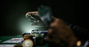 Man betting on a poker table