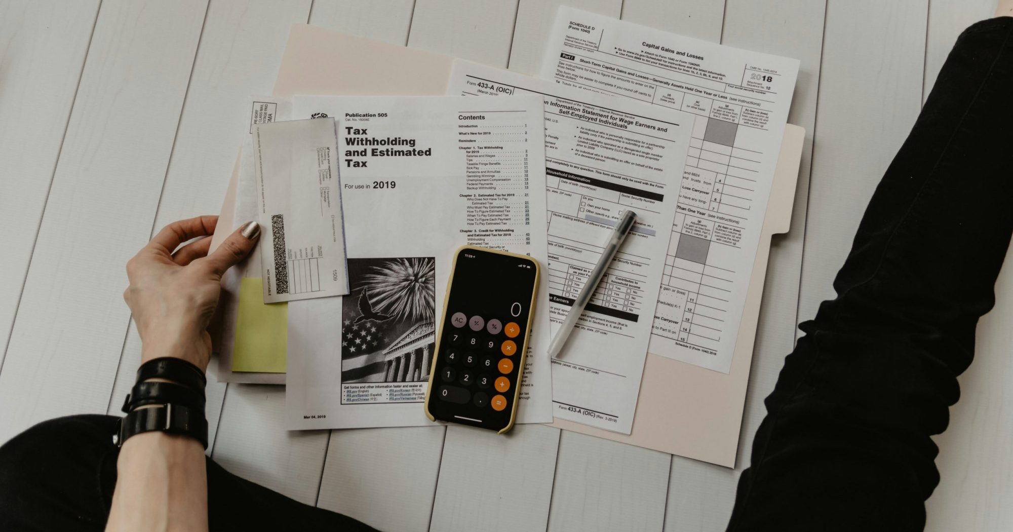 Man calculating his taxes