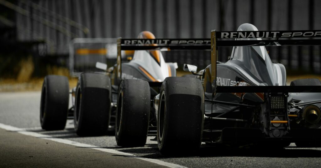 Multiple formula 1 cars on the track