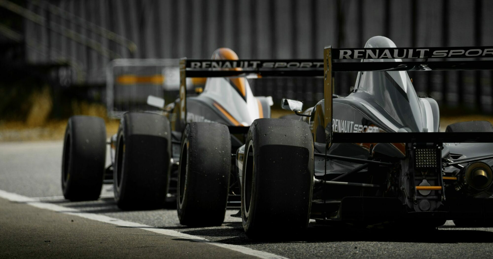 Multiple formula 1 cars on the track