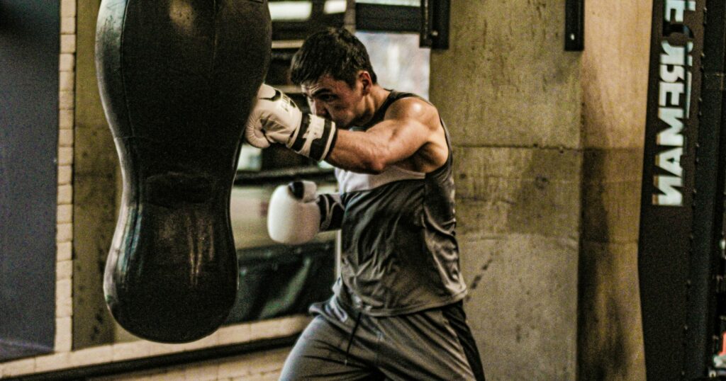 Man hitting a punching bag