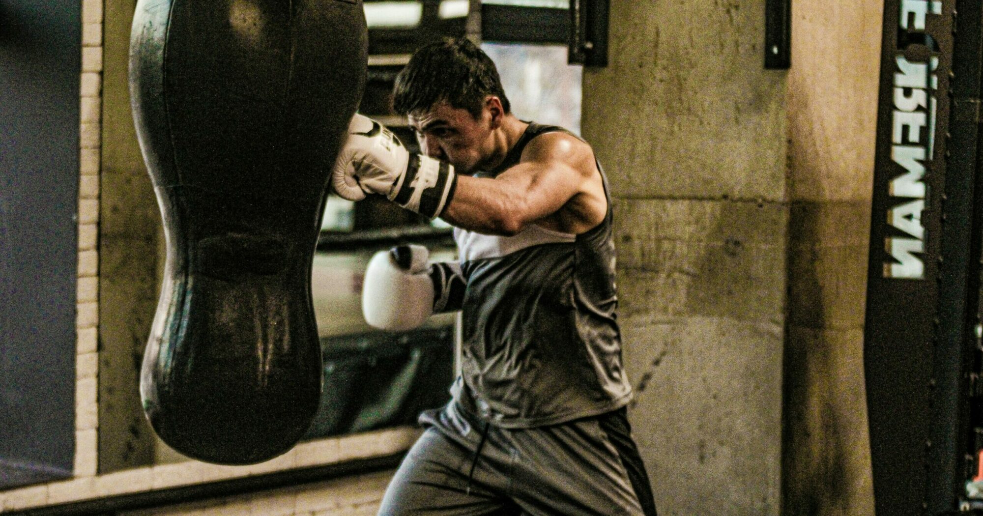 Man hitting a punching bag