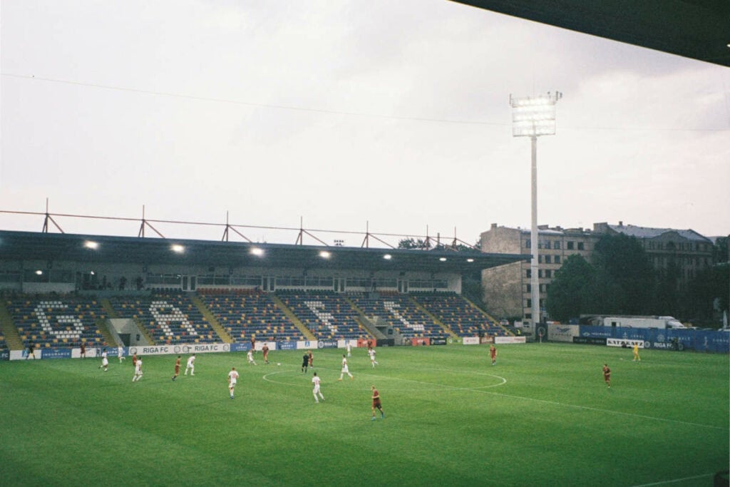 Football match in a football stadium