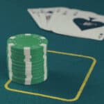 Poker cards, and Poker chips on table