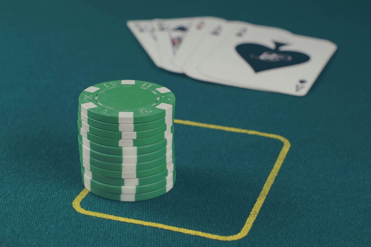 Poker cards, and Poker chips on table