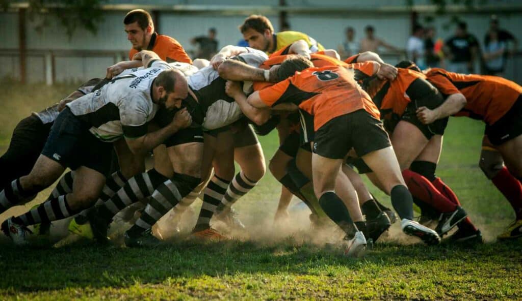 Two team fighting for a rugby ball