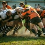 Two team fighting for a rugby ball