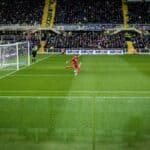 Goalkeeper kicking ball into play