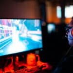 Man playing video games on the computer