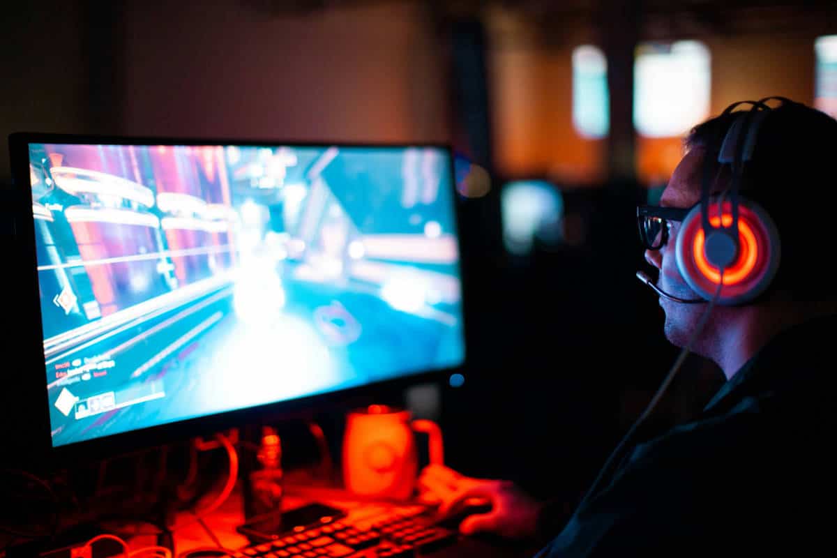 Man playing video games on the computer