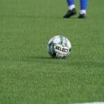 Man preparing to kick the football ball