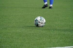 Man preparing to kick the football ball