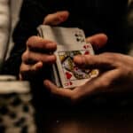 Man shuffling cards in the hands