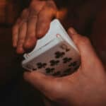 Man shuffling cards in the hands
