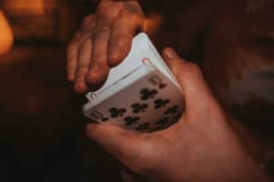 Man shuffling cards in the hands