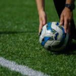Man preparing to kick the football ball