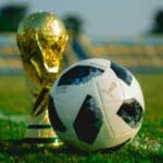 Football ball an a world cup trophy